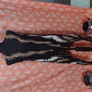 Knitted thing to wear over tank tops